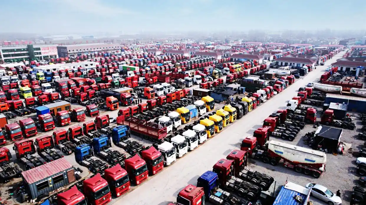 Aerial view of Sigma Truck yard with hundreds of used tractor heads ready for export